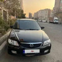 مزدا ۳۲۳ دنده مدل۱۳۸۲ ده سال خواب کم کار تمیز