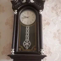 ساعت دیواری و ویترین درطرح گیتار