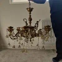 دو عدد لوستر یک میز تلفن یک دست آیینه و شمعدان