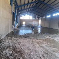 بتن ریزی با ماله پروانه ای ودوربین لیزری