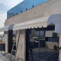 چادردوزی نصب فایبربارانگیرپشت پنجره .سایبان جکی