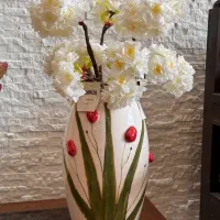 گلدان و دسته های گل