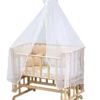 تخت و گهواره کنار مادر نوزاد