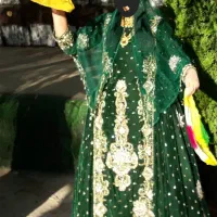 گهواره.کیسه خواب و لباس محلی