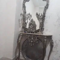 اینه شمعدان و ساعت وچهارپایه