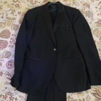 کت و شلوار ههراه با جلیقه