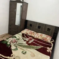 تخت خواب و کمد