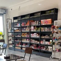 قفسه فروشگاهی رنگ مشکی در حد نو