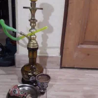 یک‌عدد‌قلیان‌تنه‌برنجی‌کامل..