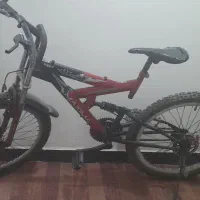 دوچرخه ماکسیما ۲۴ قرمز مشکی کمک‌دار