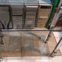 میز شیشه ای دو طبقه چرخ دار