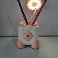 چراغ مطالعه و جامدادی و تراش  با 2 مداد و شارژر