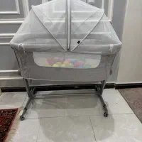 تخت نوزادی کنار مادر