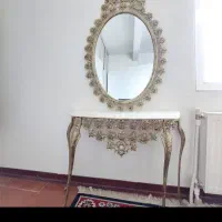 آینه و شمعدان همراه ساعت و شمعدان