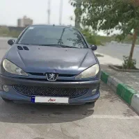 ۲۰۶ اس‌دی مدل ۸۹ ، رنگ آبی متالیک یا کاربنی|خودرو سواری و وانت|مشهد, کوه سنگی|دیوار