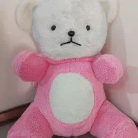عروسک خرس کلاهدار