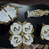 ظروف پذیرایی و کوری چینی سفید طلایی نگین دار