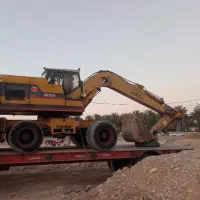 بیل مکانیکی لاستیکی