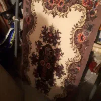 فرش یک زرع ونیم بریده نشده روی دار