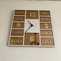 ساعت دیواری آیینه ای