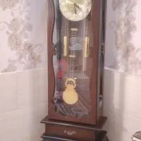 ساعت قدی وبوفه باظروف داخلش نو