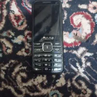 یک عدد گوشی جی ال ایکس