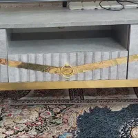 میز تلویزیون در حد نو تمیز یکماه خرید کردم