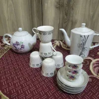 قوری و فنجان چای خوری و نعلبکی زیر استکان