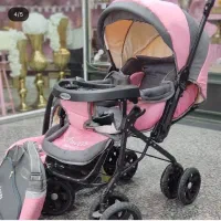 دوعدد کالسکه دلیجان و صندلی خودرو کودک