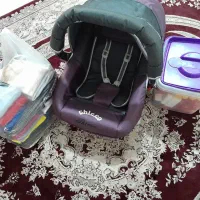کریر و سطل خانه بازی کودک و کفش و لباس بچه