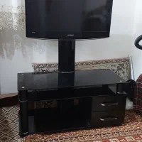 تلویزیون سامسونگ و دستگاه دیجیتال و میز  در حد نو