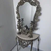 لوازم برنجی اینه شمعدان وساعت دیواری درعکس بعد