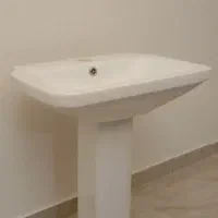 روشویی به همراه لوله خرطومی و زیرآب و تشتک استیل