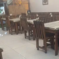به چند خانم و آقا داخل آشپزخونه نیازمند
