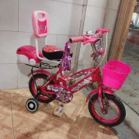 دوچرخه سایز ۱۲ صورتی دخترانه در حد نو