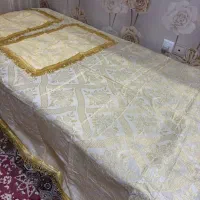 رو تختی یک نفره همراه دو رو بالشتی