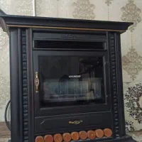 بخاری بزرگ چدنی طرح شومینه توافقی