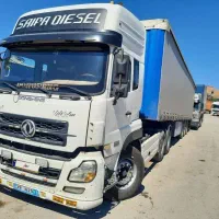 البرز کشنده ده چرخ همراه با ترانزیت سه محور