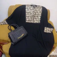 عبا به همراه کیف