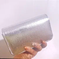 کیف مجلسی رنگ نقره ای دارای بند بلند