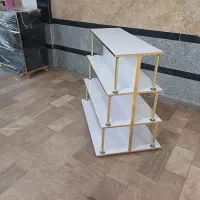 استند وسط مغازه ویترینی میله دار شیک