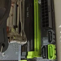 مادربرد به همراه cpu و فن خنک گننده