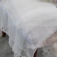 لباس عروس و تاج و تور