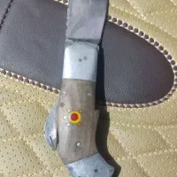 چاقو ضامن دار نی‌ریز