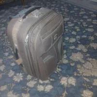 چمدان مسافرتی سالم کم کارکرد .