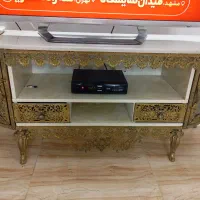 زیر تلویزیونی برونز بسیار شیک وسالم
