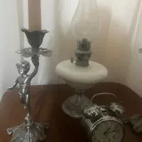 شمعدان پیوتر طرح فرشته چراغ پیوتر و ساعت رومیزی