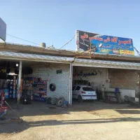 دو-باب-مغازه-و-محوطه-دور-دیوار