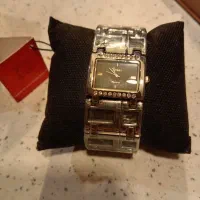 ساعت برند نو با جعبه و باطری لطفا توضیحات بخوانید