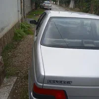 پژو 405نقره ای بدون آفتاب سوختگی فنی سالم